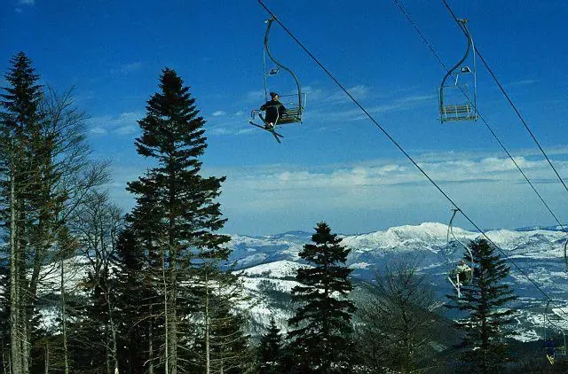 Skier ascending the Stinji Do chairlift at Bjelašnica, 1985