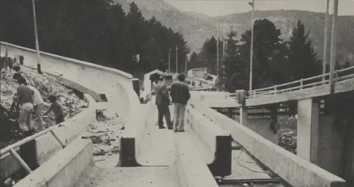 Workers and officials inspect the Trebević bobsled track construction in 1982.