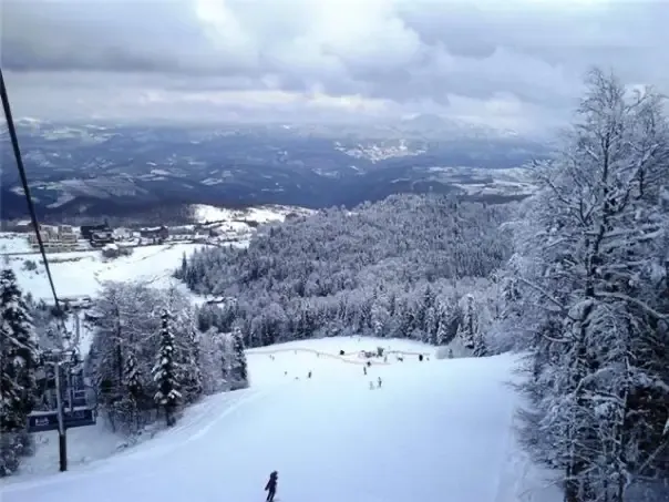 Skiers descend the redeveloped Olympic runs at Bjelašnica in 2009