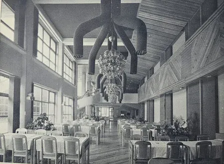 Modernist interior of the Hotel Famos dining hall during the 1980s