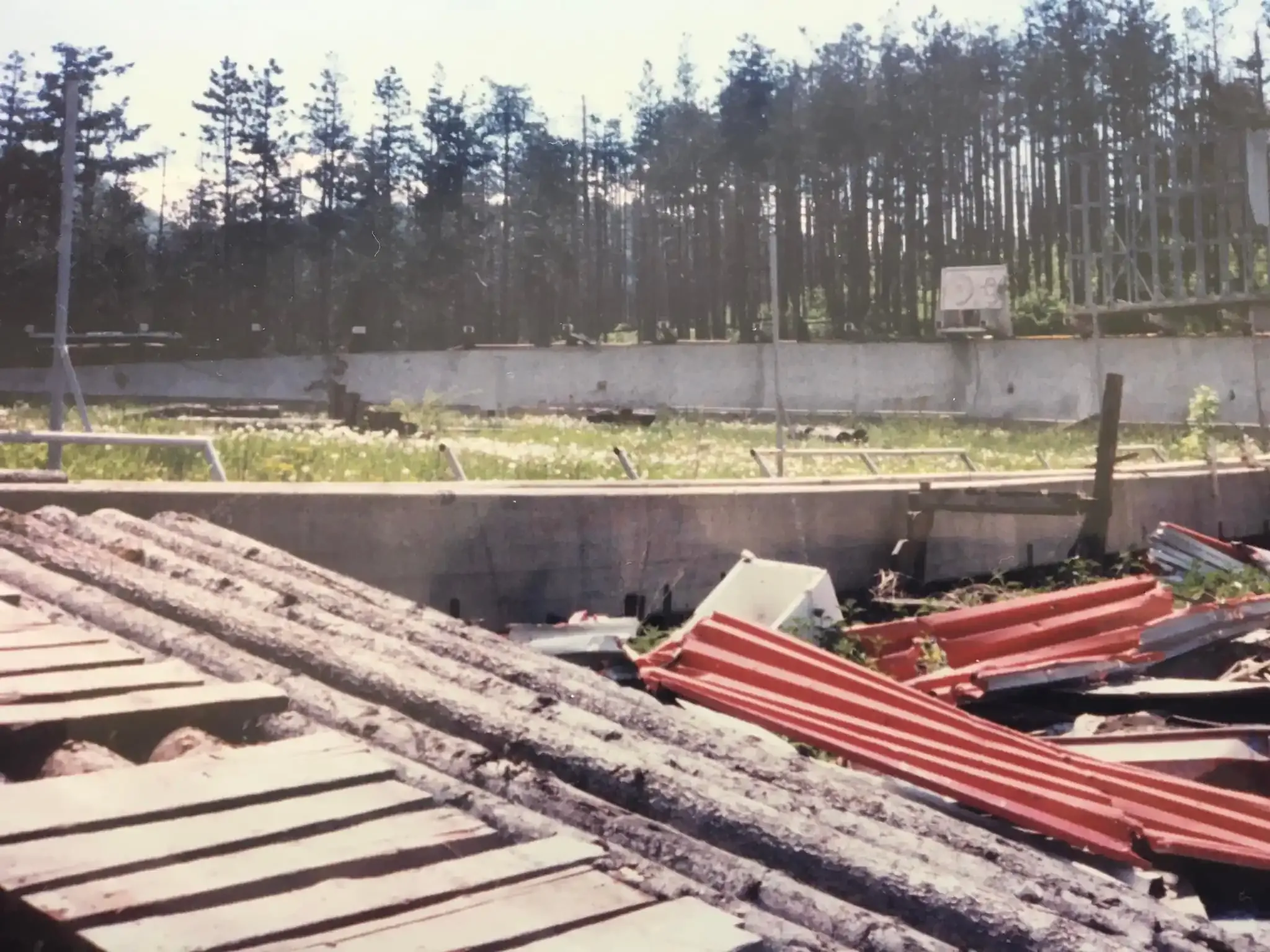 Debris and overgrowth at the Trebević bobsled track in 2000