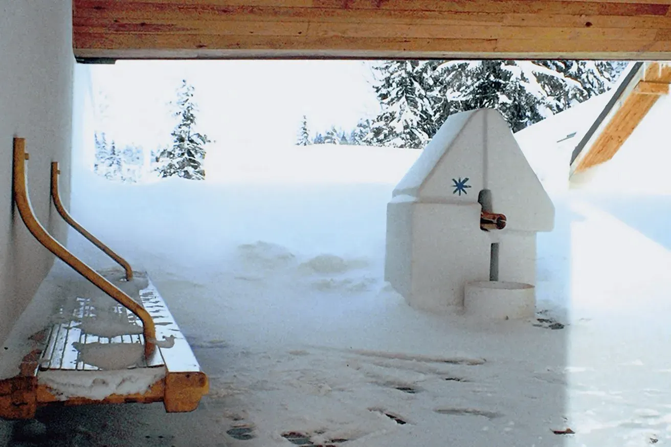 A snow-covered terrace and fountain at Hotel Vučko in the 1980s.
