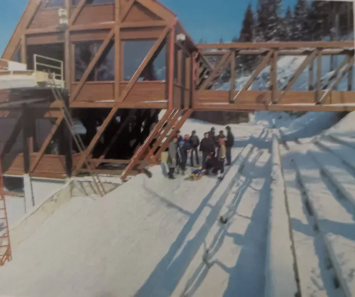 Athletes and officials gather at the Trebević bobsled track start, 1983