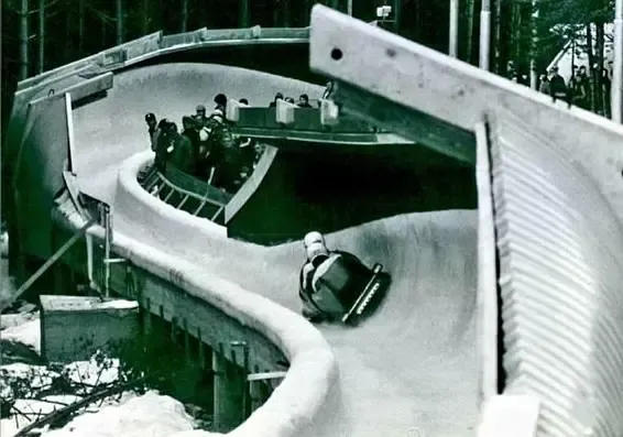 A bobsled team navigates the Trebević Olympic track in 1984