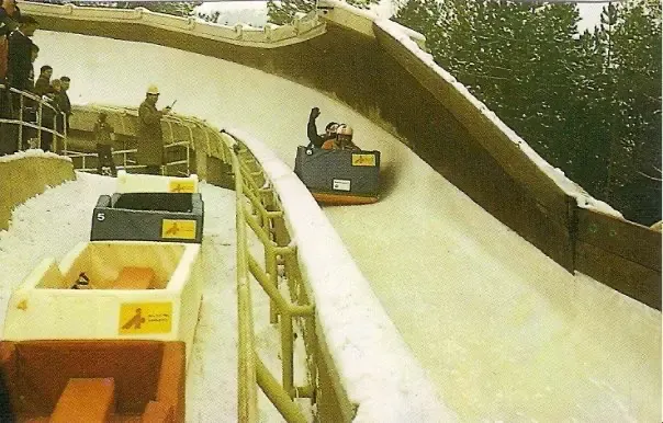 Passengers ride a rubber Vučko bobsled on the Trebević Olympic track, 1985