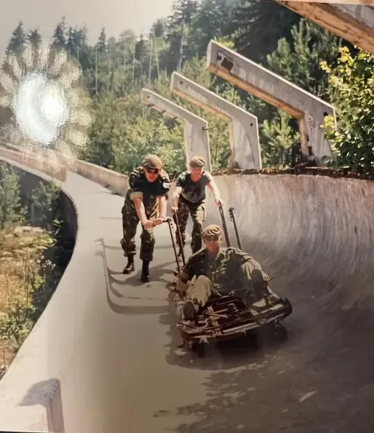 Soldiers navigate the abandoned Trebević bobsled track in 1998