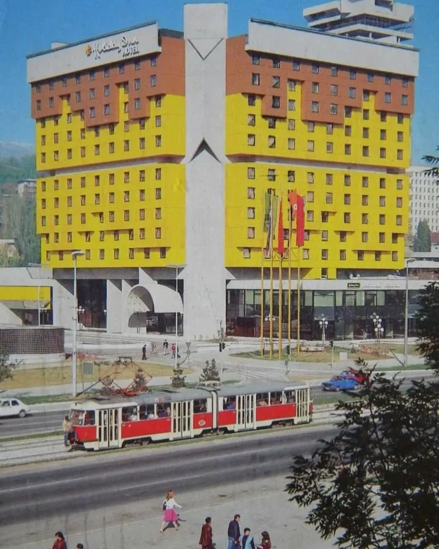 The distinctive yellow facade of the Sarajevo Holiday Inn in 1983