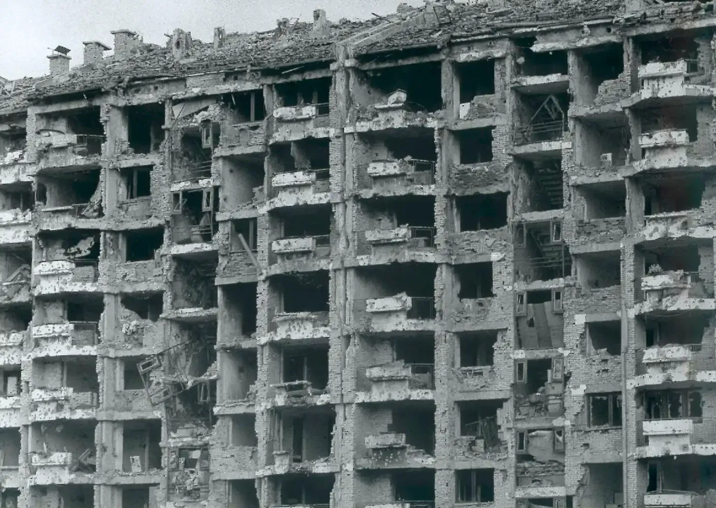 War-damaged facade of the Dobrinja Olympic Press Village, 1990s