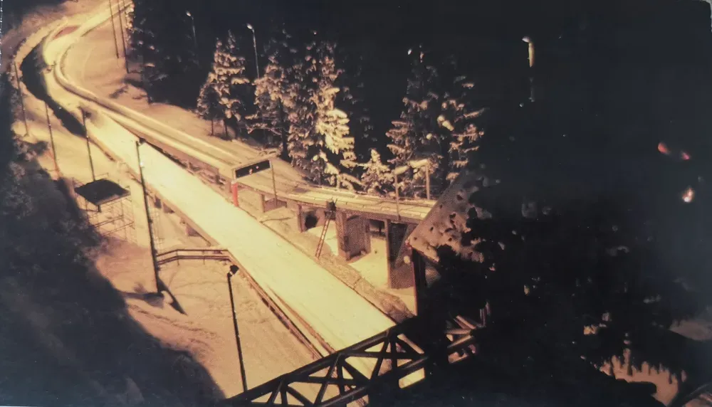 Nighttime view of the Trebevic bobsled track start house in 1983