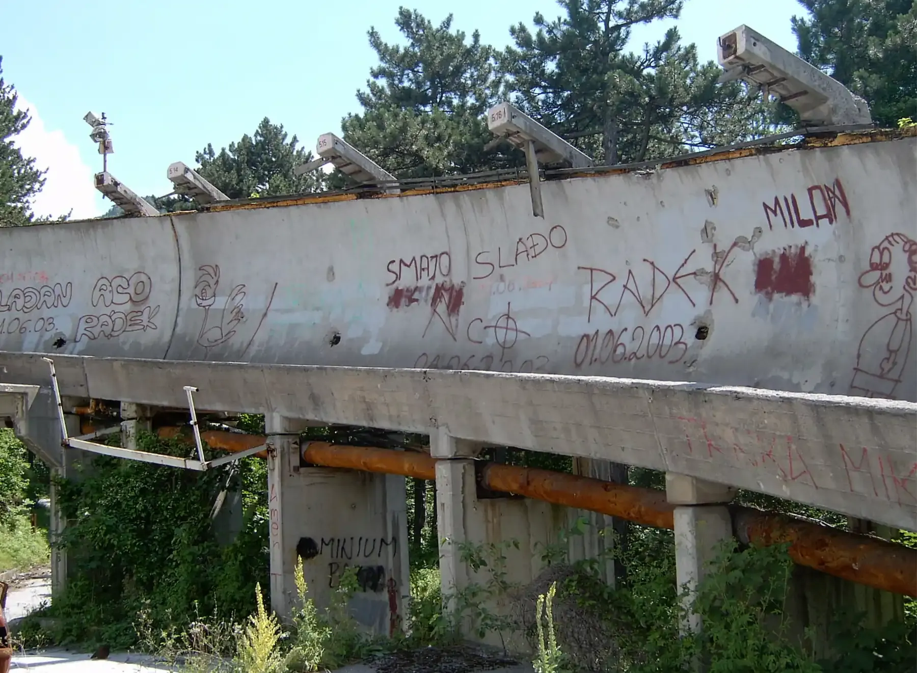 Graffiti and damage on the Trebević Olympic bobsled track in 2004